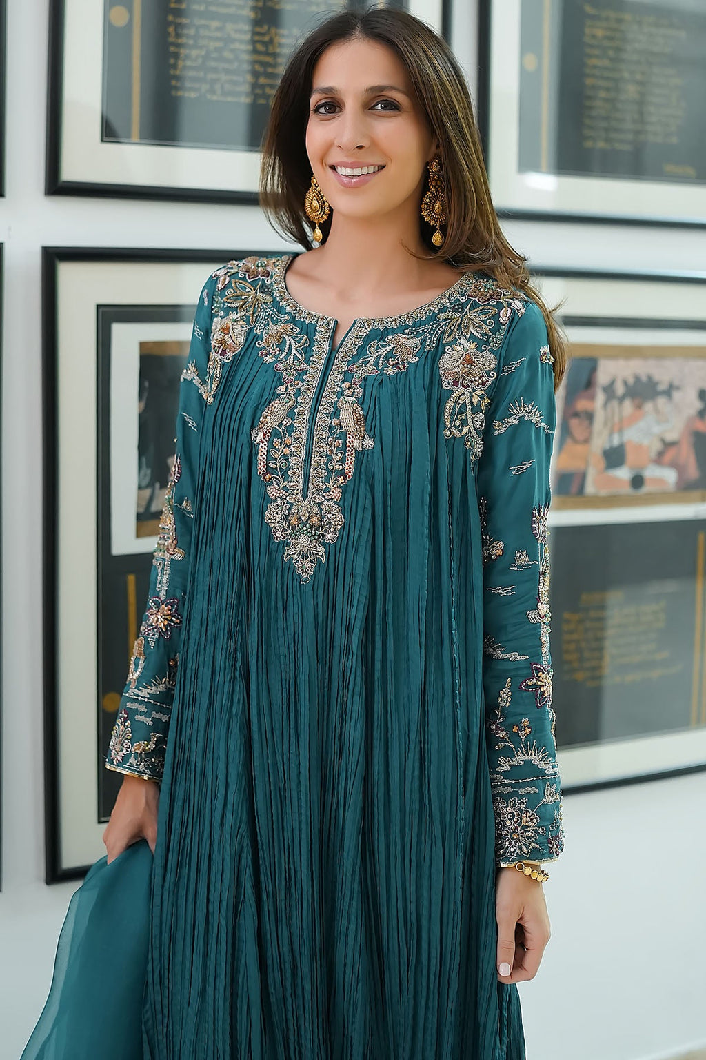 "Focus on sleeve trims and hemline patch work of Motifz 0079 Mahnoor hand embellished silk outfit, showing boutique stitching quality and lace insertions."