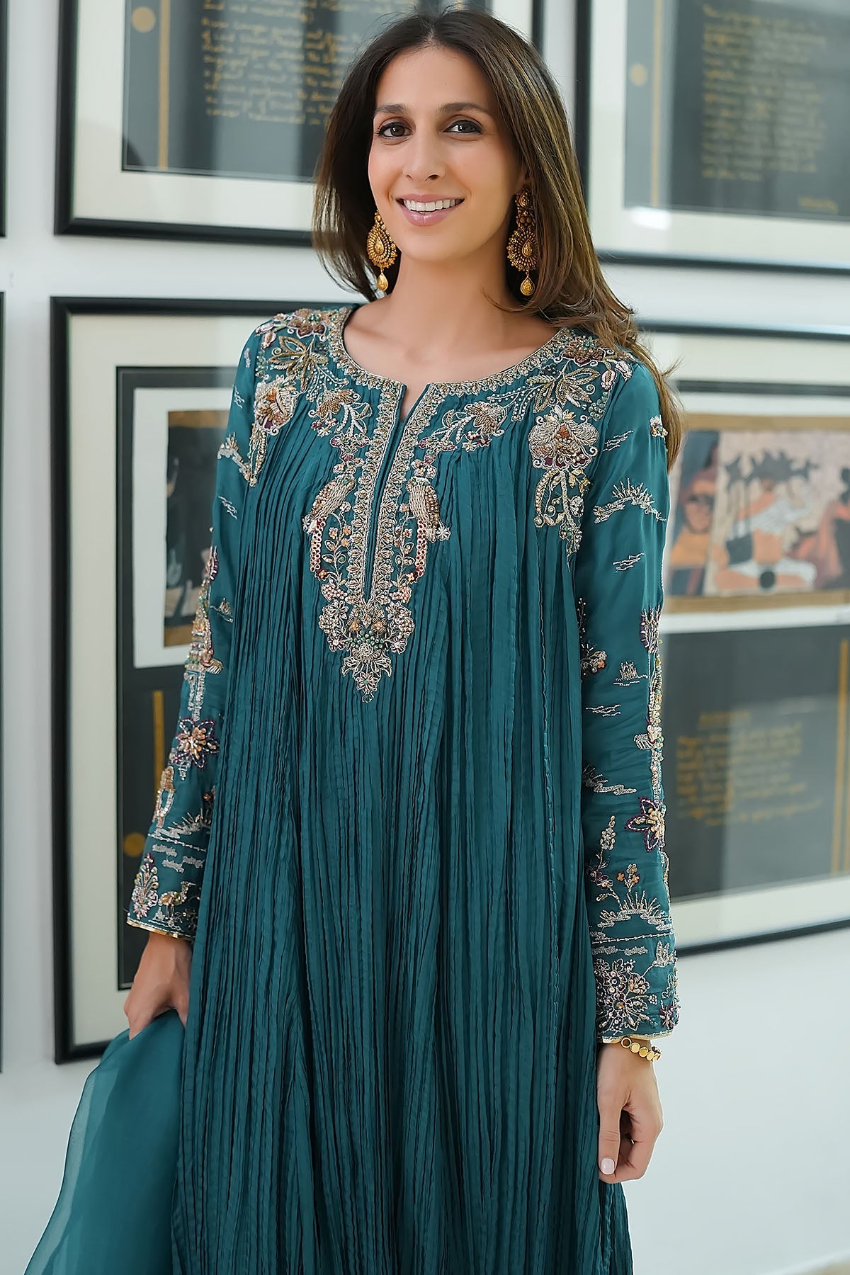 "Focus on sleeve trims and hemline patch work of Motifz 0079 Mahnoor hand embellished silk outfit, showing boutique stitching quality and lace insertions."