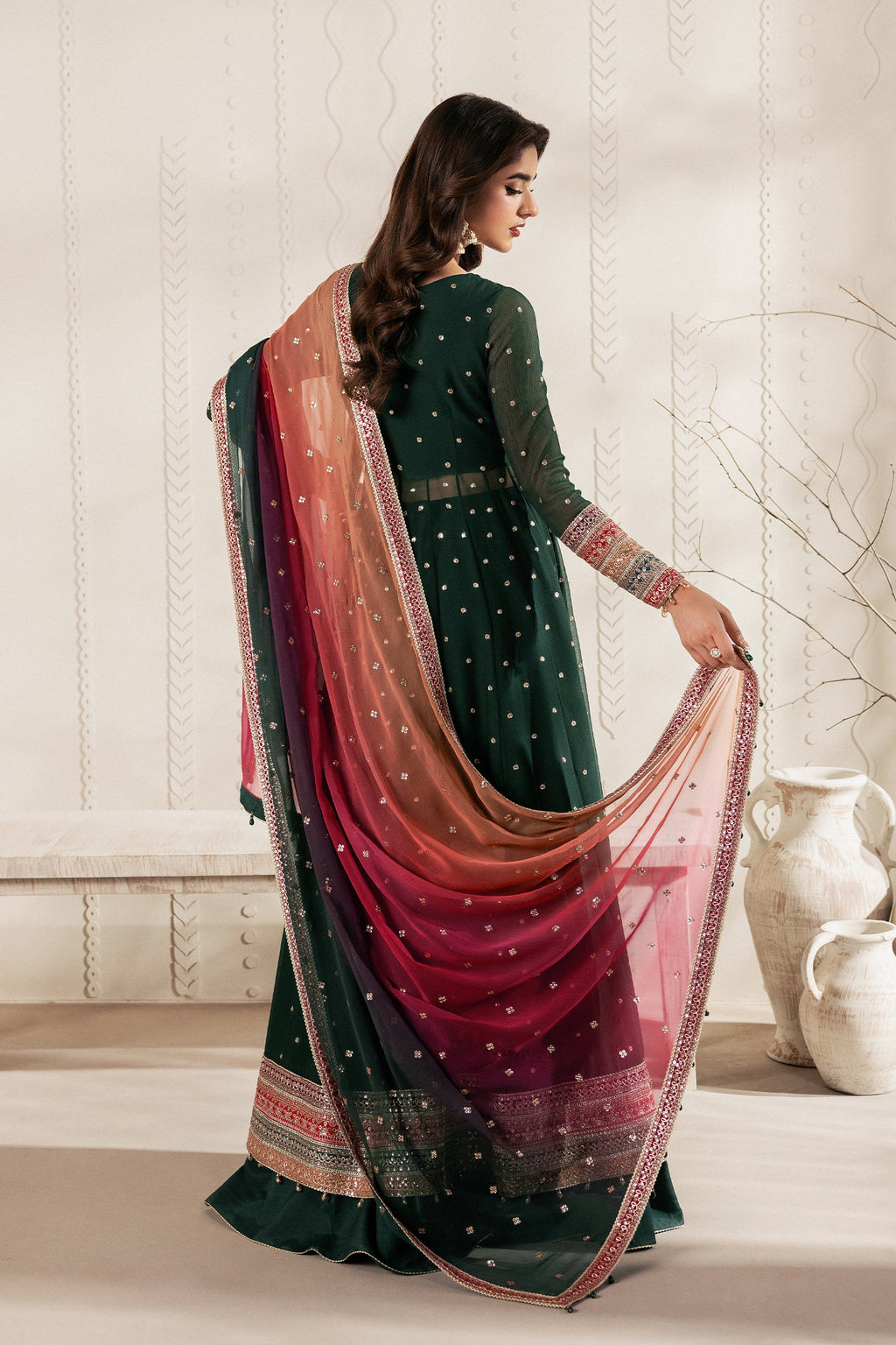 "Detailed drape view of the fluid embroidered dupatta paired with the Zarif ALVA luxury suit from Mirha Collections."