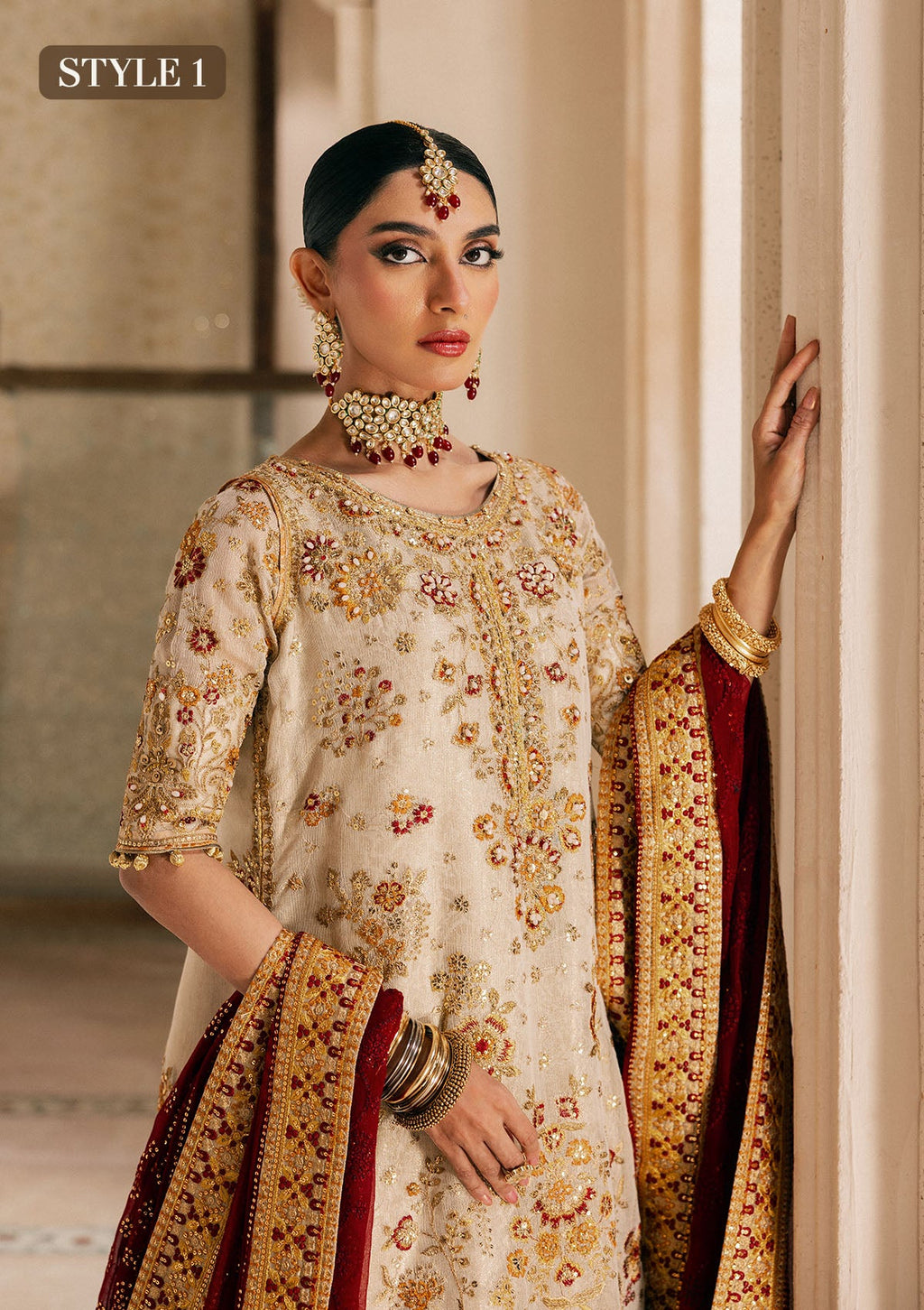 "Close-up premium craftsmanship on Aik Wedding Festive Look A2603 dress, highlighting the intricate traditional Ada hand embellishments, sparkling crystal beadwork, and dense tilla layout along the neckline and front panels."