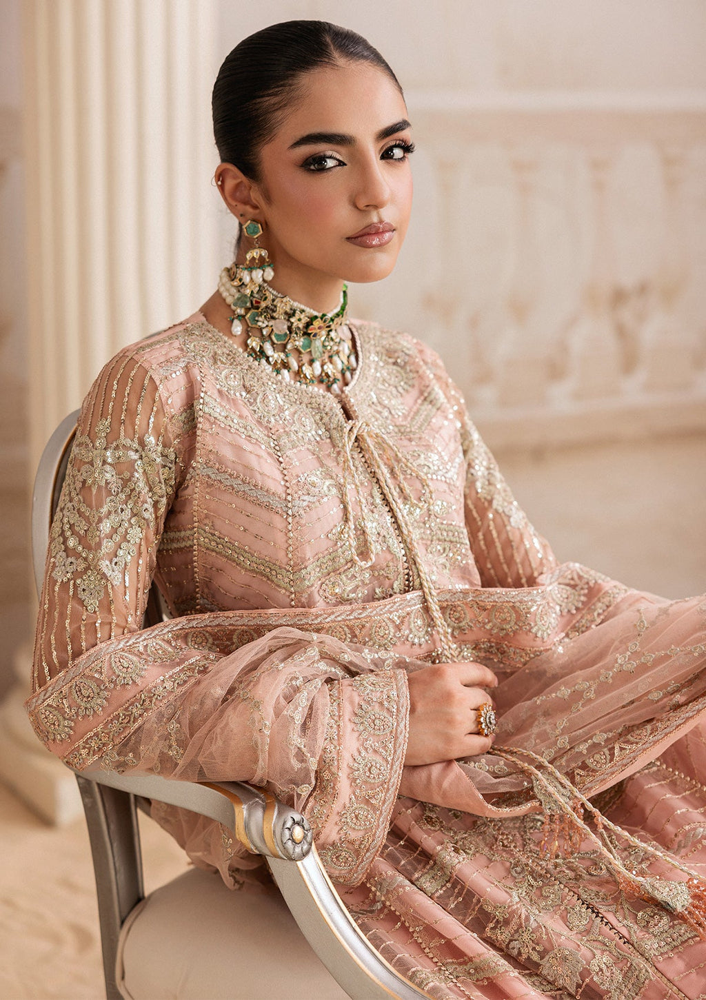 "Close-up detailing on the Aik Shaam Look B2605 bodice, highlighting intricate tilla embroidery, shimmering sequins, and fine hand-placed Ada embellishments along the neckline."