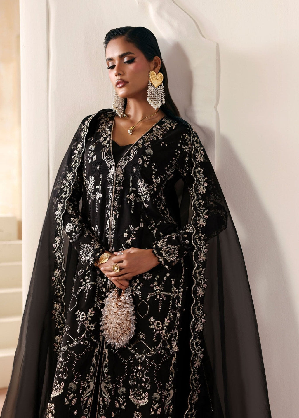 "Detailed shot of the premium bottle green organza dupatta from the Kanwal Malik Mahsa collection, highlighting the elegant drape, fine texture, and neat signature embroidered border layouts."