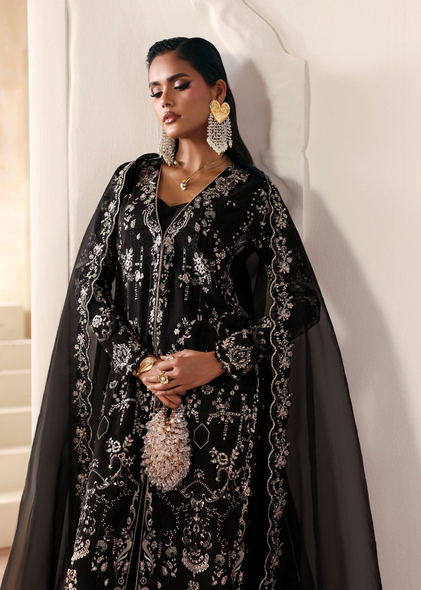 "Detailed shot of the premium bottle green organza dupatta from the Kanwal Malik Mahsa collection, highlighting the elegant drape, fine texture, and neat signature embroidered border layouts."