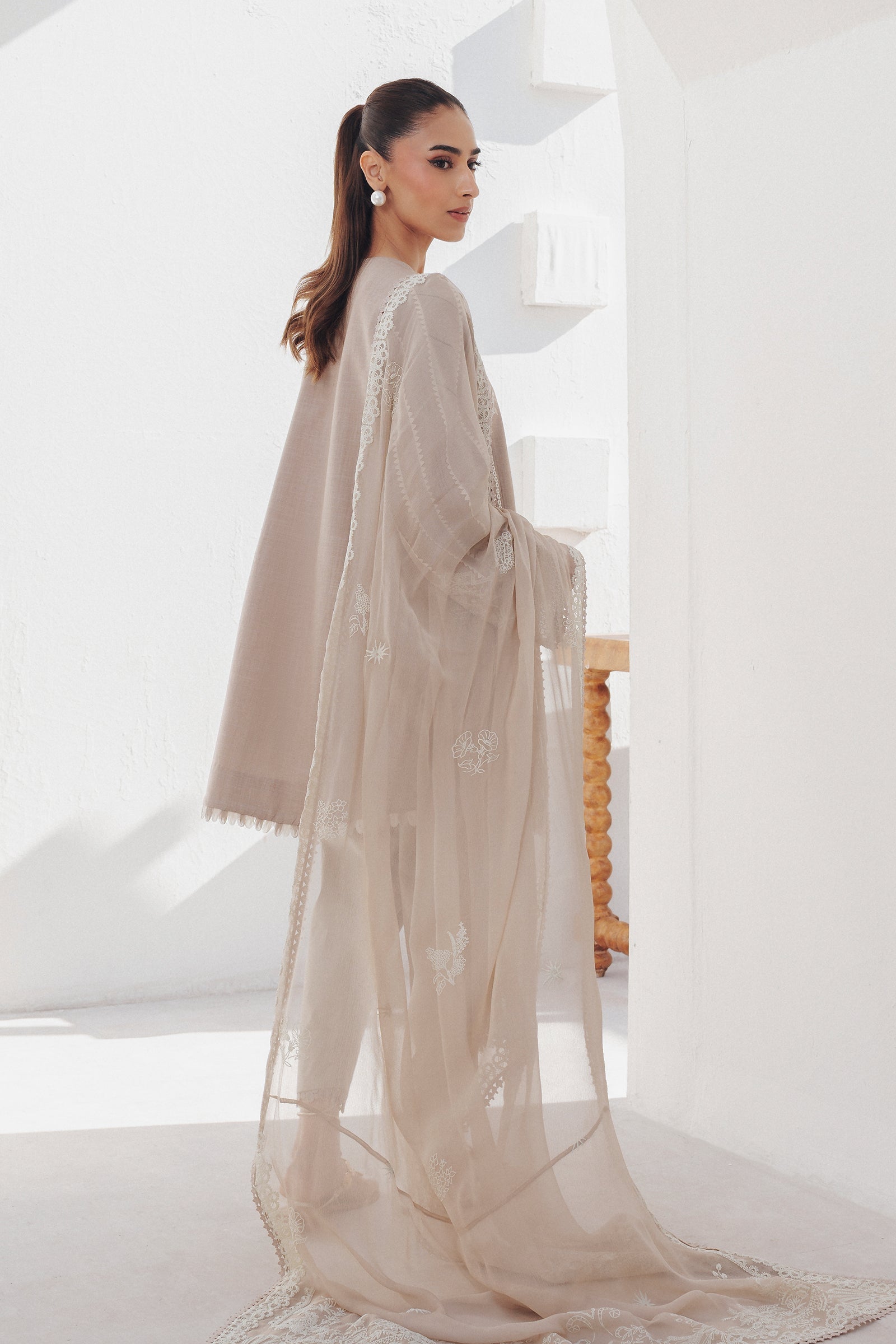 "Detailed drape view of the fluid luxury embroidered dupatta paired with the Qalamkar QBP-08 ELKE formal suit from Mirha Collections."