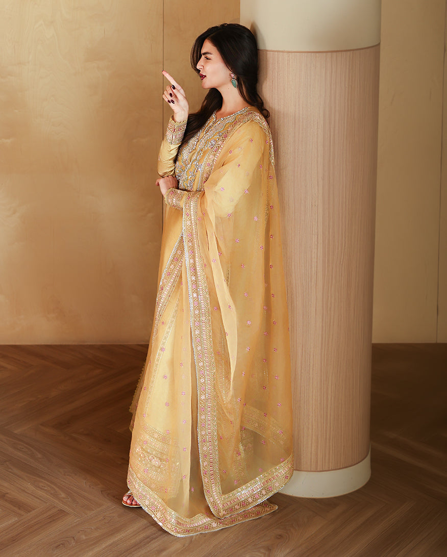 "Detailed drape view of the fluid luxury embroidered dupatta paired with the Mushq Ezel formal suit from Mirha Collections."