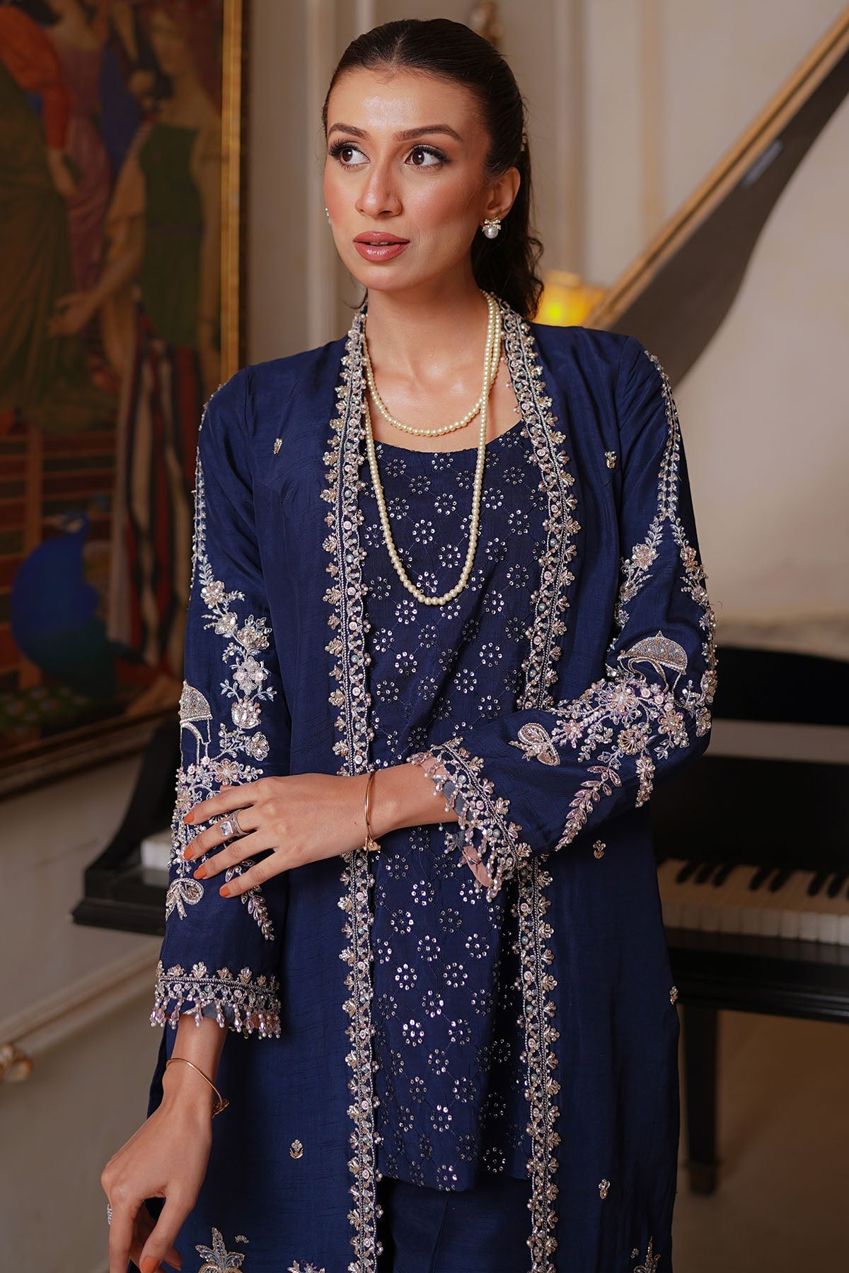"Draped view of the embellished luxury dupatta included with the Motifz 0083 Elisha Korean silk suit, featuring delicate embroidered borders and a fluid drape."