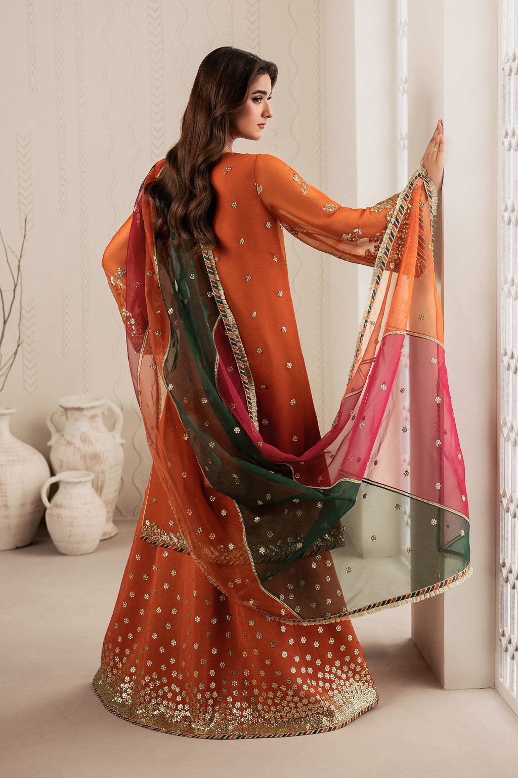 "Detailed drape view of the luxury sequins embroidered organza dupatta with chattapatti lace borders paired with Zarif SUNOOR."