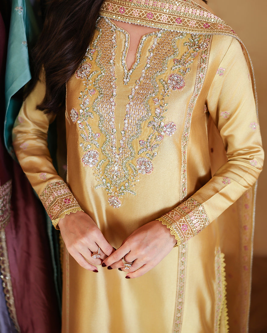 "Close-up detailing on the Mushq Ezel shirt bodice, displaying fine threadwork embroidery, embellished neck finishes, and soft fabric texture."