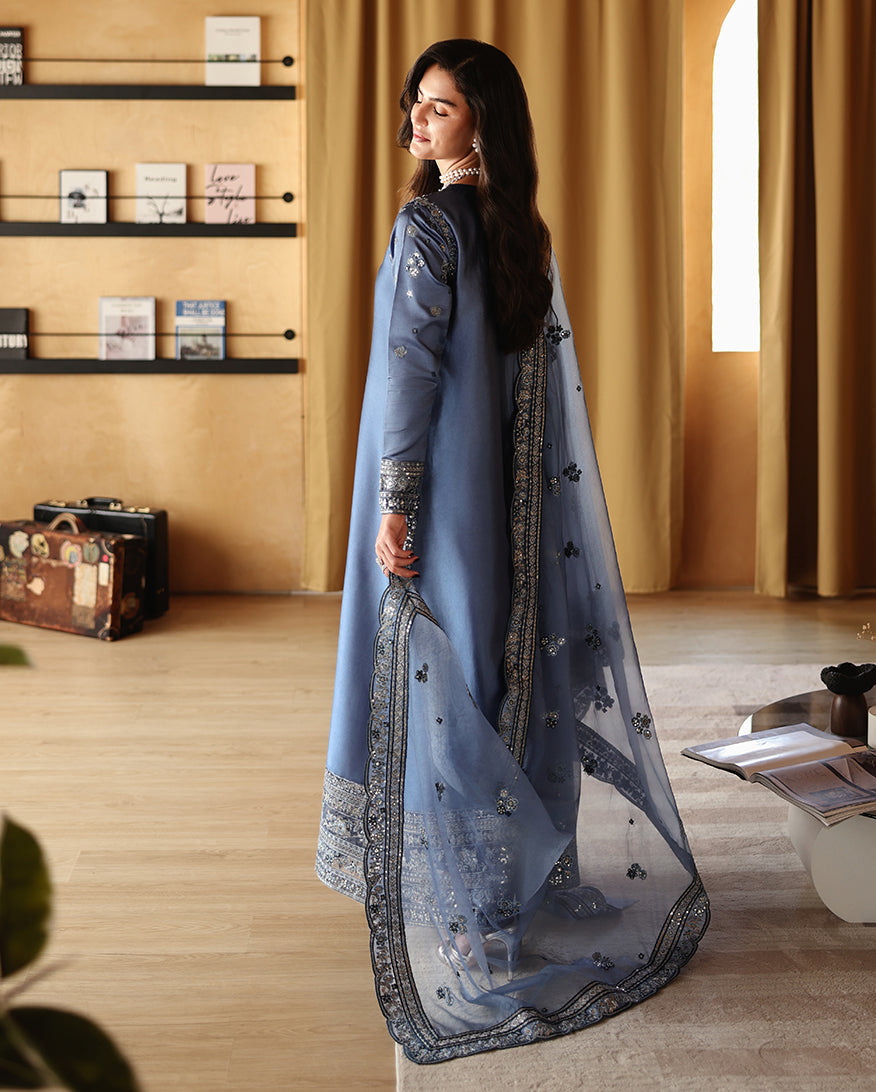 "Detailed drape view of the fluid luxury embroidered dupatta paired with the Mushq Auren formal suit from Mirha Collections."