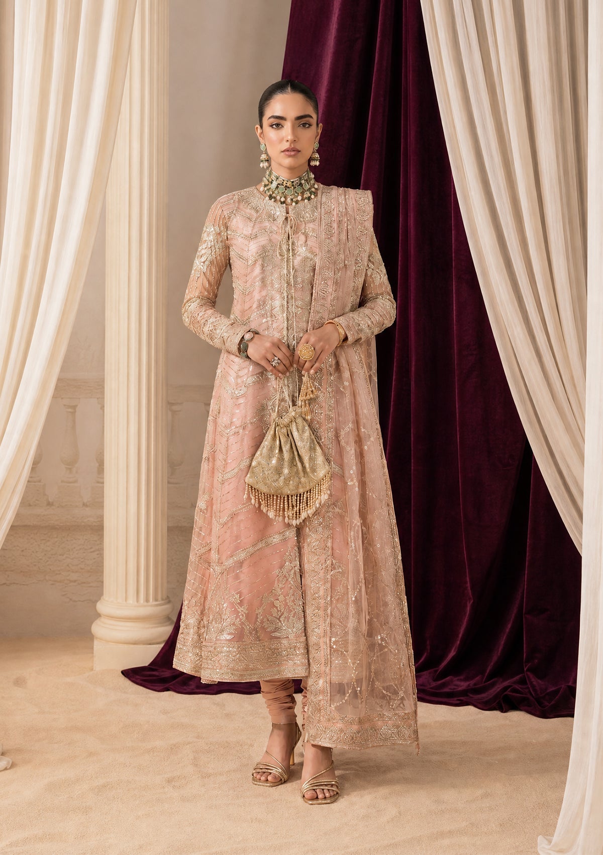 "Lower frame and sleeve focus of Aik Shaam Look B2605, emphasizing multi-textured embroidered patch borders, precise stitching lines, and tailored cuff finishes."