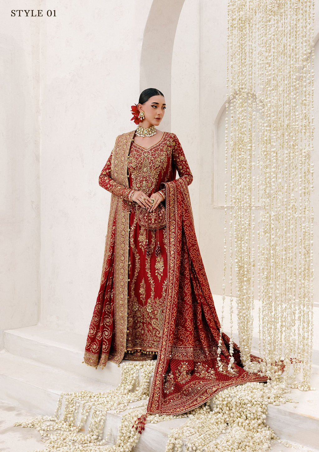 "Lower frame and sleeve profile view of the Aik Wedding Festive Look B2501 ensemble, focusing on the multi-layered embroidered organza patches, clean structural stitching, and elegant sleeve border finishes."