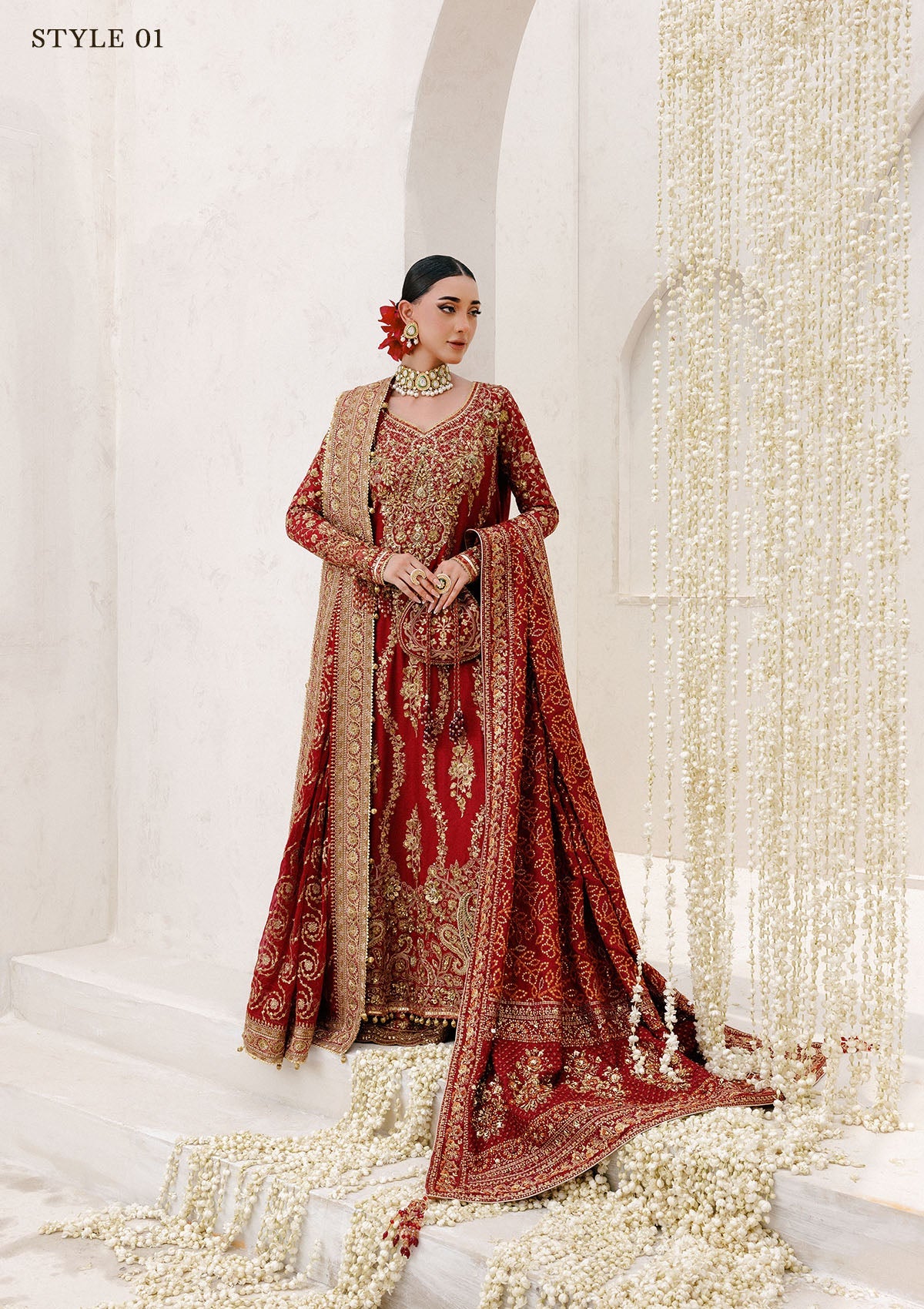 "Lower frame and sleeve profile view of the Aik Wedding Festive Look B2501 ensemble, focusing on the multi-layered embroidered organza patches, clean structural stitching, and elegant sleeve border finishes."
