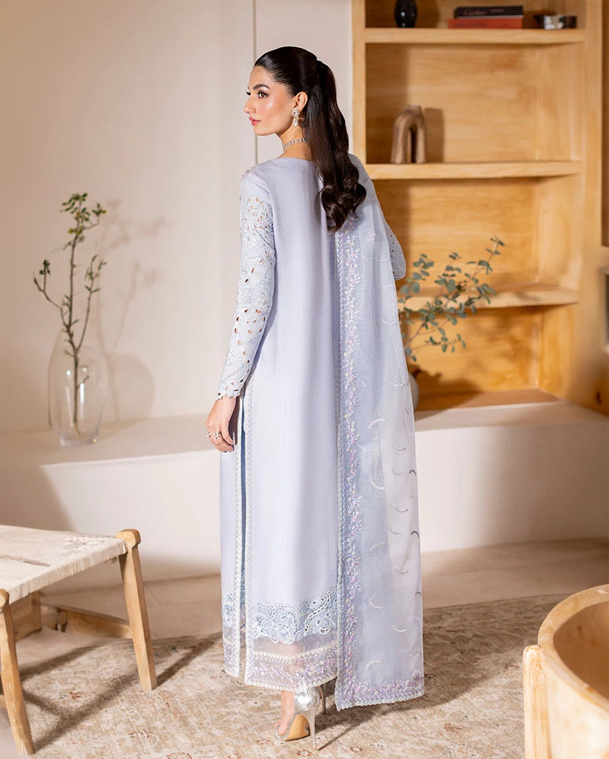 "Focus on the intricate sleeve cuff trimmings and lace hemline details of the Mushq Verve stitched luxury suit, showing boutique-quality tailoring."