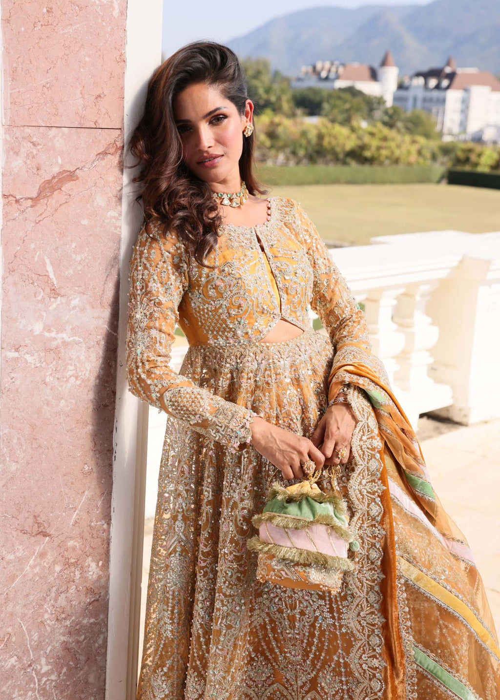 "Close-up premium detailing on the Kanwal Malik Merna shirt, highlighting the stunning layout of intricate traditional threadwork embroidery, delicate hand-crafted crystal embellishments, and fine adda craft along the neckline."