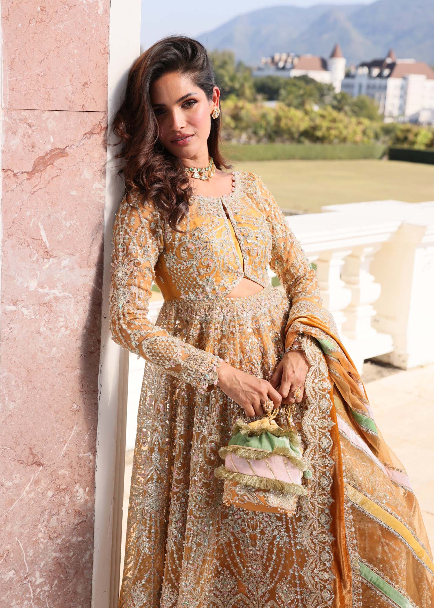"Close-up premium detailing on the Kanwal Malik Merna shirt, highlighting the stunning layout of intricate traditional threadwork embroidery, delicate hand-crafted crystal embellishments, and fine adda craft along the neckline."