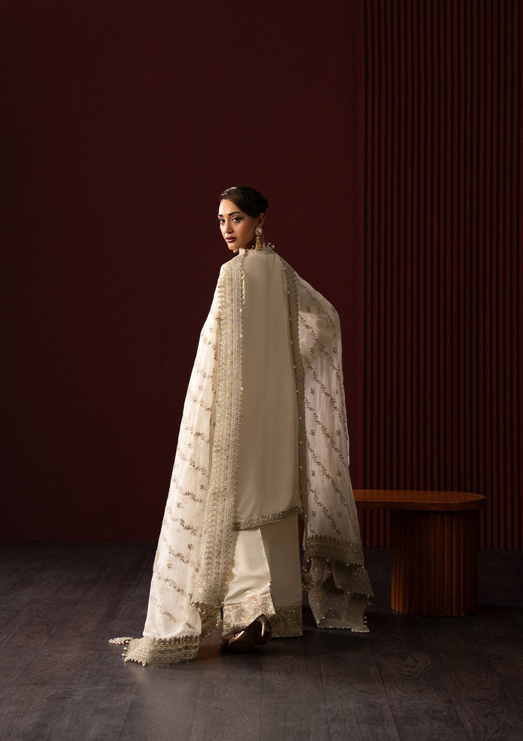 "Focus on the lower shirt hemline and sleeves of Lady Aik Look A2501, featuring embroidered organza patch borders, neat lace insertions, and tailored finishes."