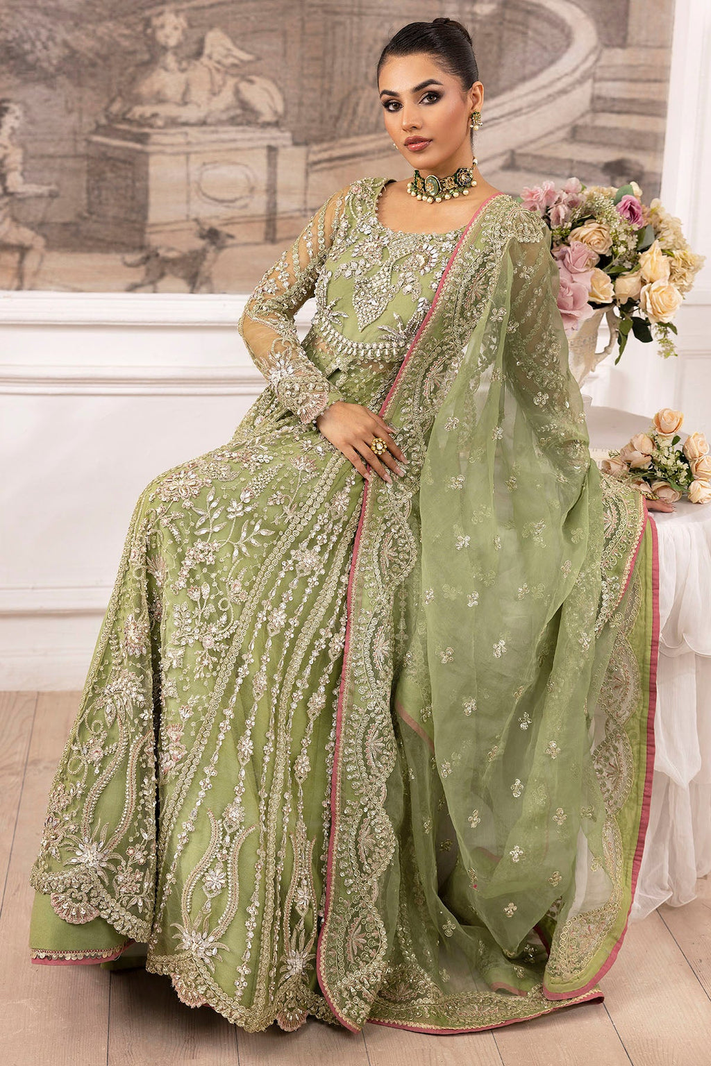 "Detailed shot of the soft embroidered silk net dupatta from the Motifz Iyara collection, showcasing embroidered border trims and light fluid drape."