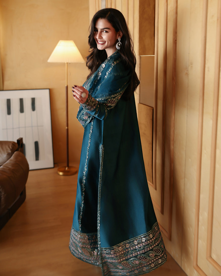 "Detailed drape view of the fluid luxury embroidered dupatta paired with the Mushq Cyra formal suit from Mirha Collections."