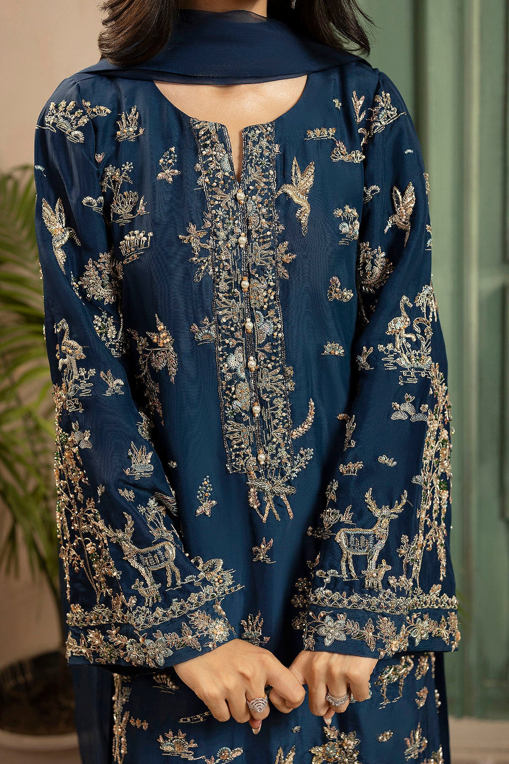 "Detailed close-up of Motifz 0074 Afsana stitched silk shirt bodice, highlighting delicate hand-embellished zardozi work, tilla embroidery, and sequin accents."