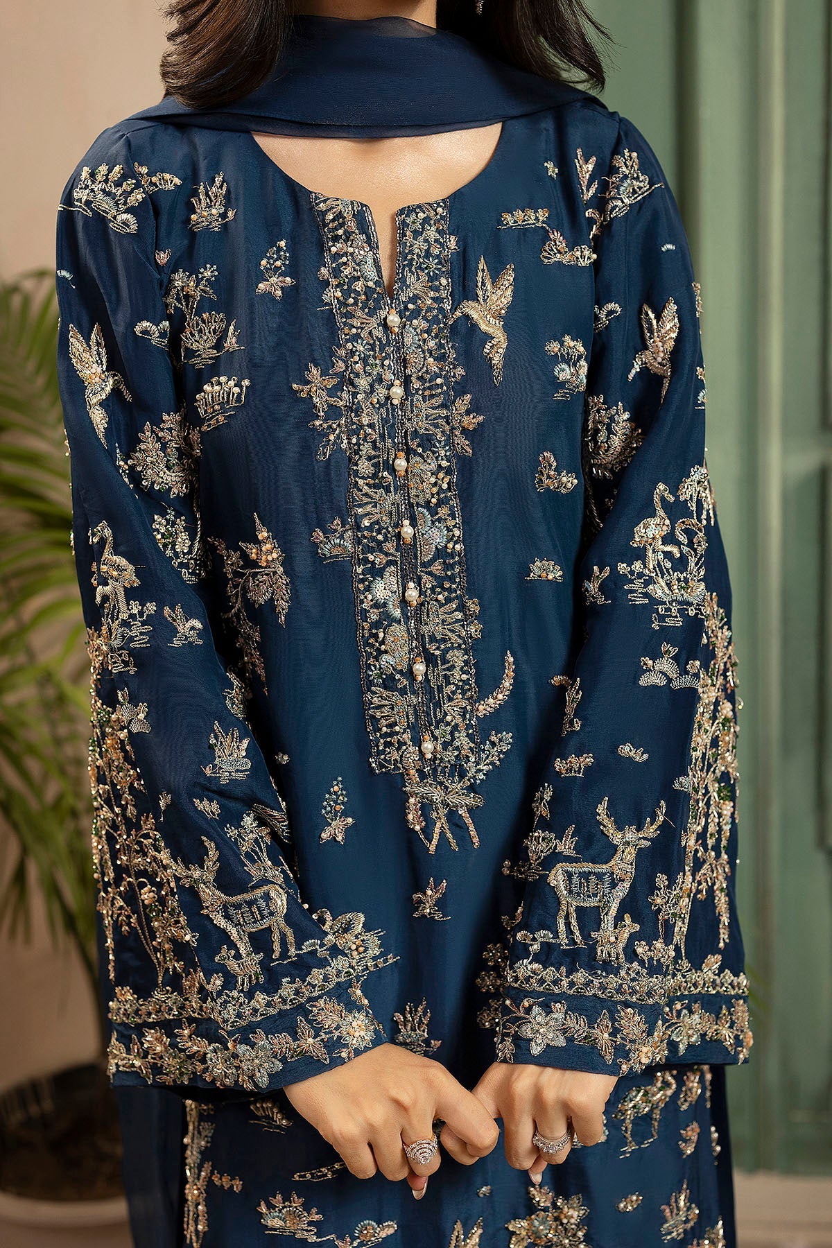 "Detailed close-up of Motifz 0074 Afsana stitched silk shirt bodice, highlighting delicate hand-embellished zardozi work, tilla embroidery, and sequin accents."