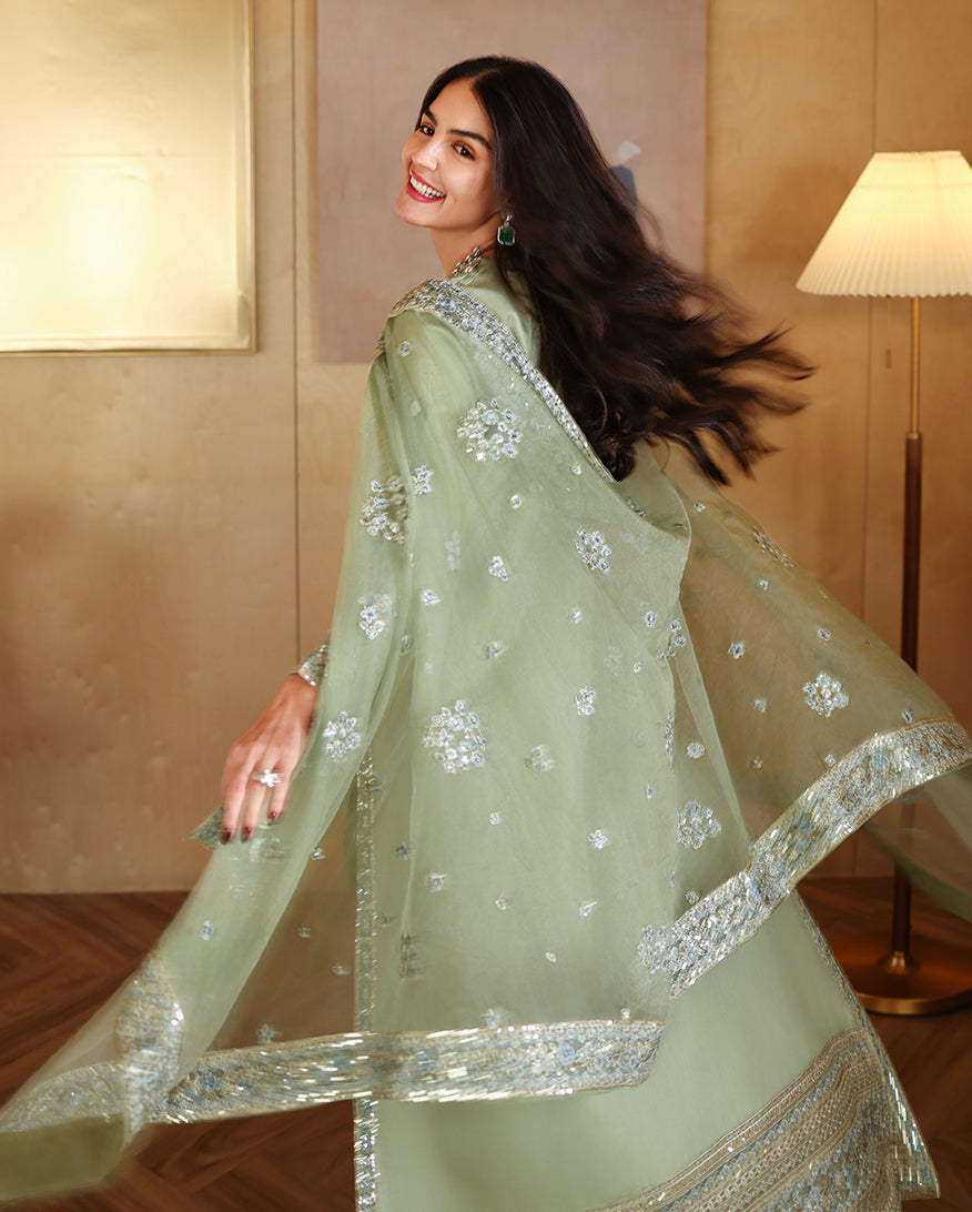 "Detailed drape view of the fluid embroidered dupatta paired with the Mushq Veha luxury Sheesha Silk suit from Mirha Collections."