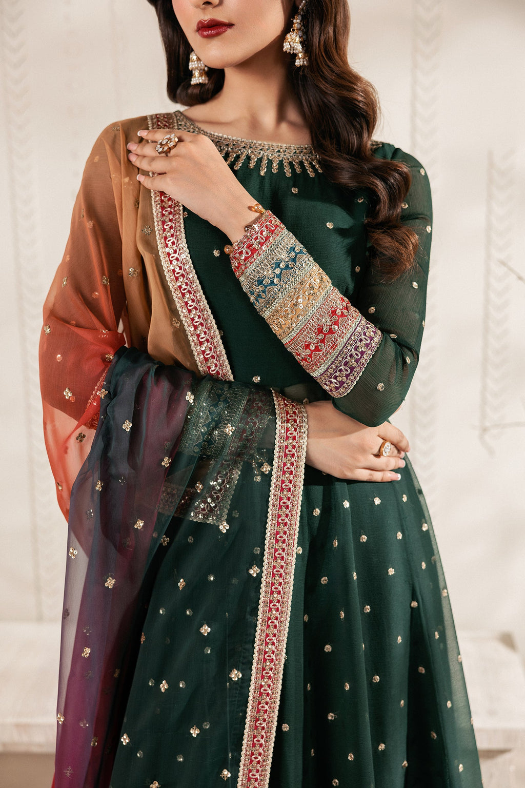 "Close-up detailing on the Zarif ALVA shirt bodice, displaying fine threadwork embroidery, embellished neck finishes, and soft fabric texture."
