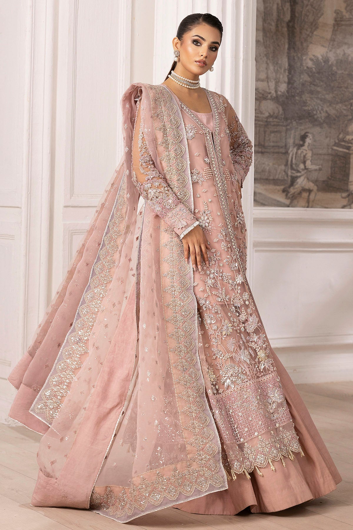 "Detailed shot of the soft embroidered silk net dupatta from the Motifz 4935-AHLAM collection, showcasing embroidered border trims and light fluid drape."