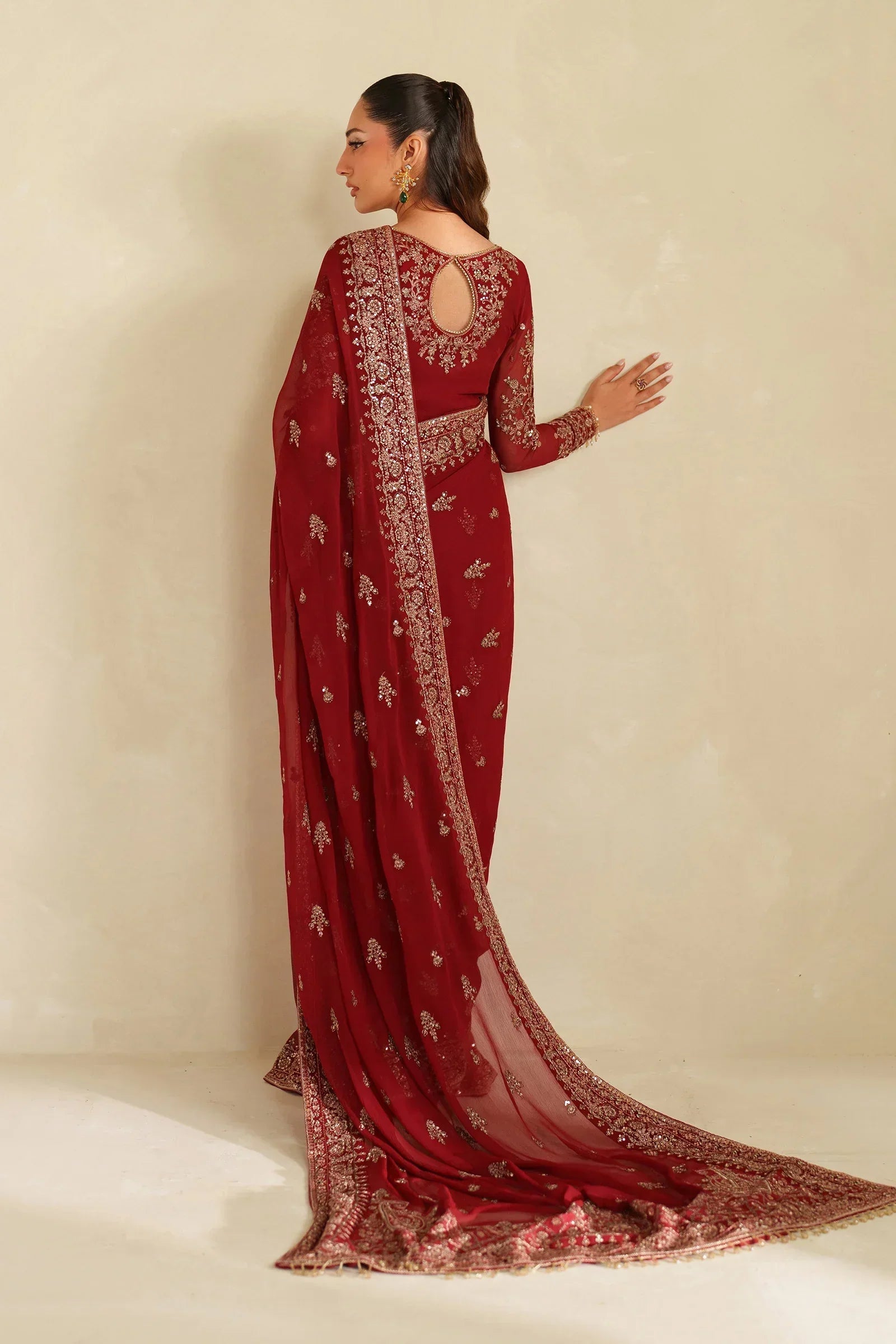 "Detailed drape view of the fluid embroidered dupatta paired with the Zarif Sumrah luxury ensemble from Mirha Collections."