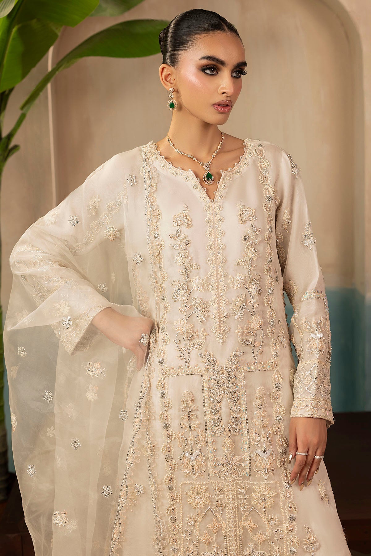"Mirha Collections Motifz 0073 Aila embroidered organza stitched three-piece Pakistani designer formal suit. Full-length off-white shirt paired with fluid crushed silk trousers and an embellished organza dupatta."