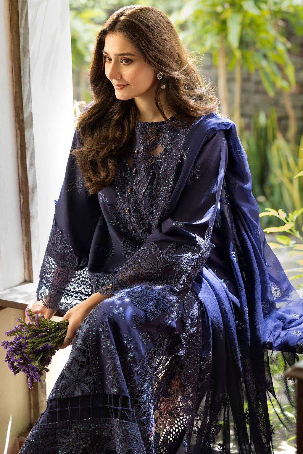 "Detailed shot of the soft luxury dupatta from the Motifz Campania collection, emphasizing its vibrant print or embroidery sprays and light fluid drape."