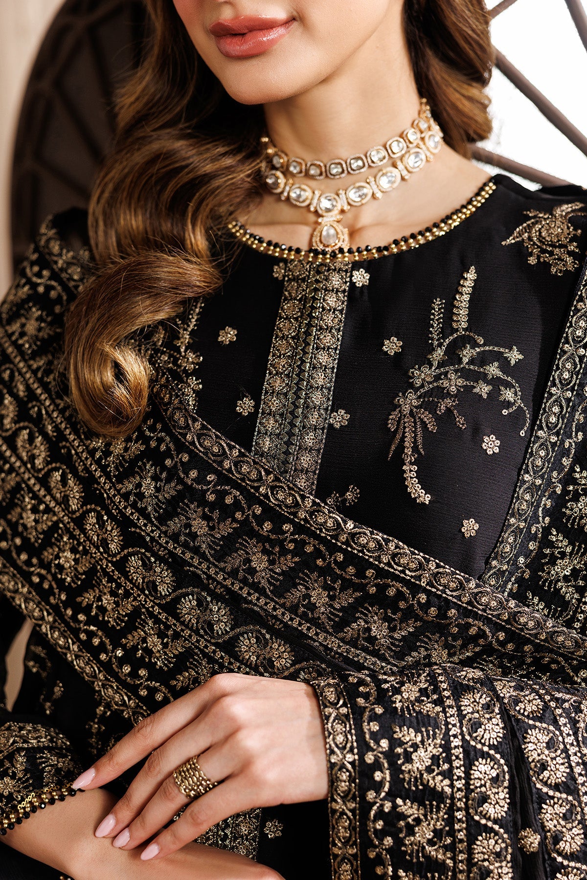 "Focus on the intricate sleeve cuff trimmings and hemline details of the Zarif ZYR-SUMBUL-05 stitched formal suit, showing boutique-quality tailoring."