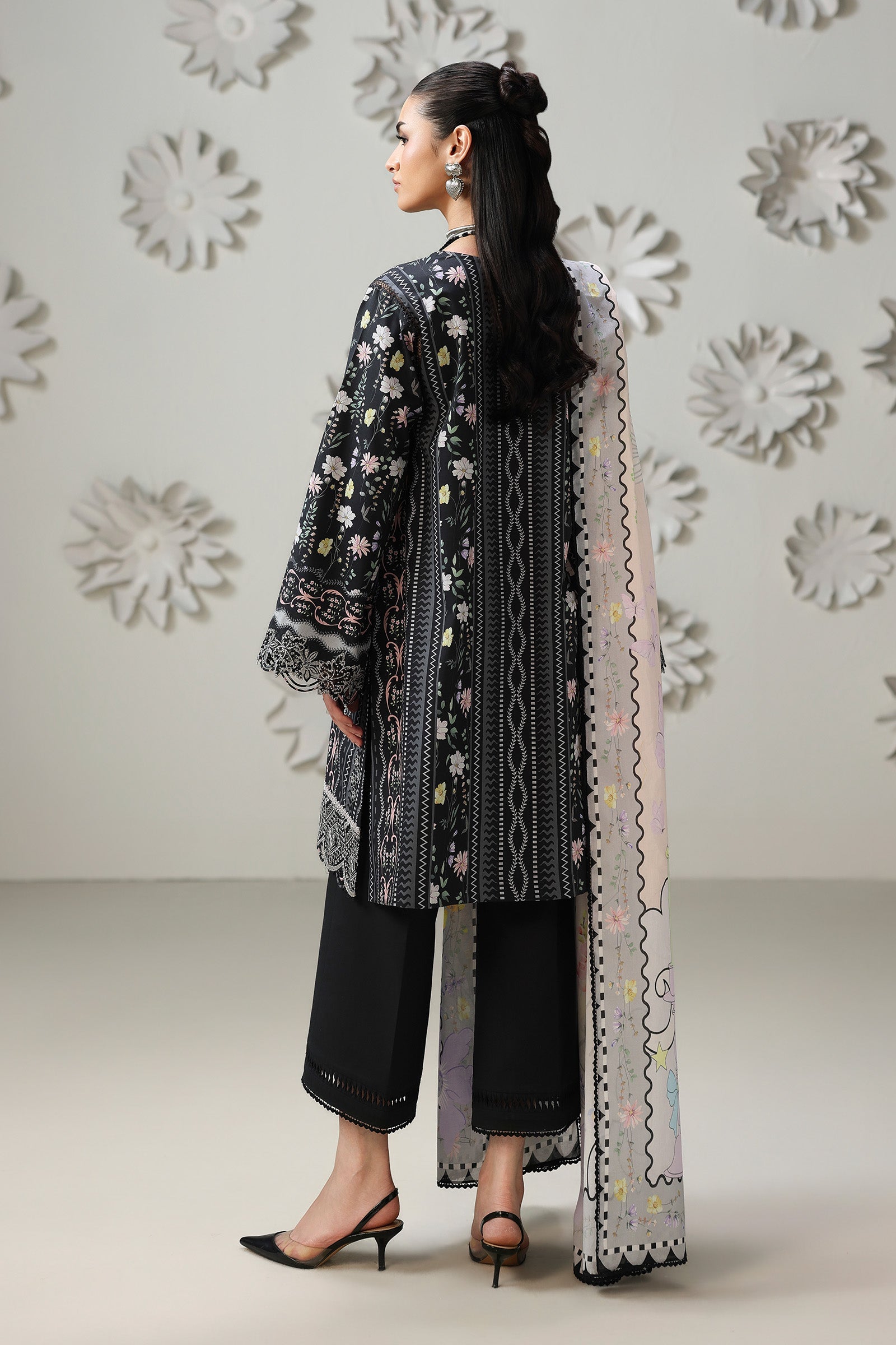 "Focus on the intricate sleeve cuff trimmings and lace hemline details of the Qalamkar QQP-08 (A) AMEL stitched formal suit, showing boutique-quality tailoring."