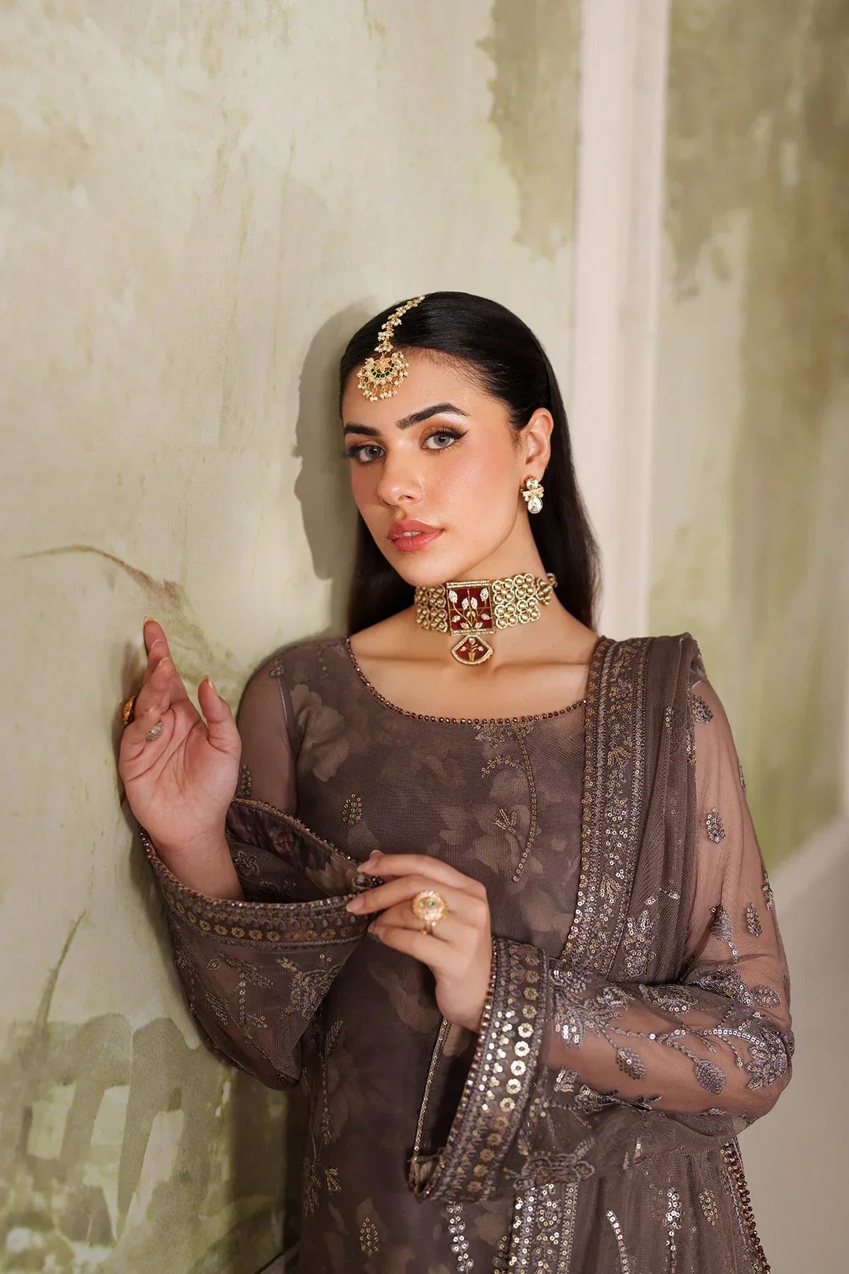 "Focus on the intricate sleeve cuff trimmings and hemline details of the Zarif ZRF-ZPE-08 MAHVEER stitched formal suit, showing boutique-quality tailoring."