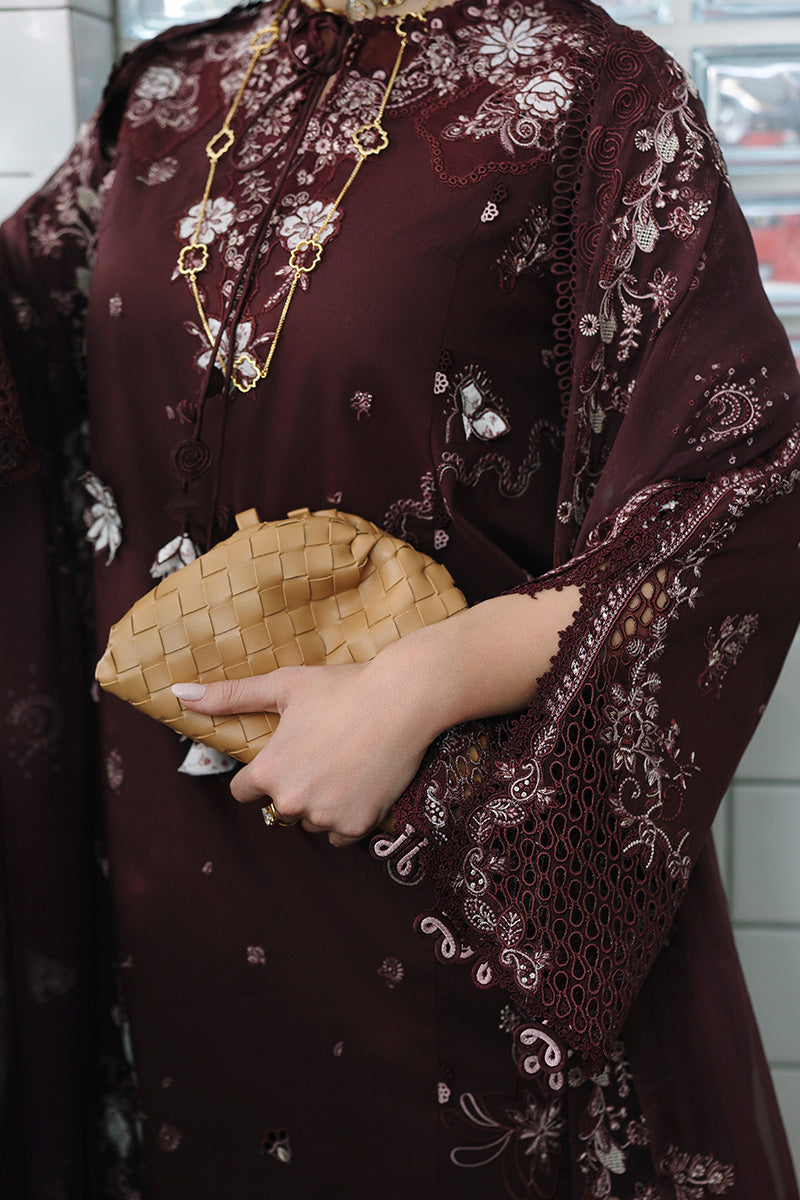 "Close-up detailing on the Qalamkar CM-01 ESHAL shirt bodice, displaying fine laser-cut neck finishes, embroidered panels, and soft fabric texture."